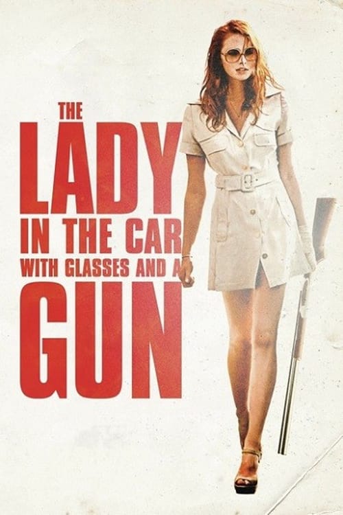 Arabadaki Gözlüklü Ve Silahli Kadın